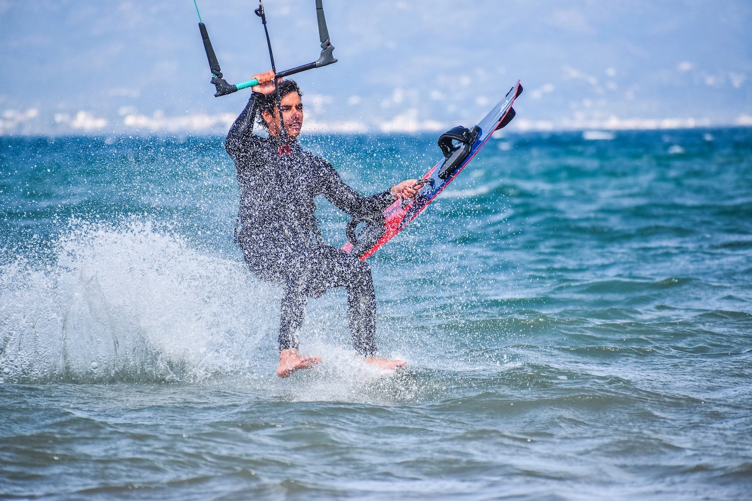 barefoot ski trick kitesurfing